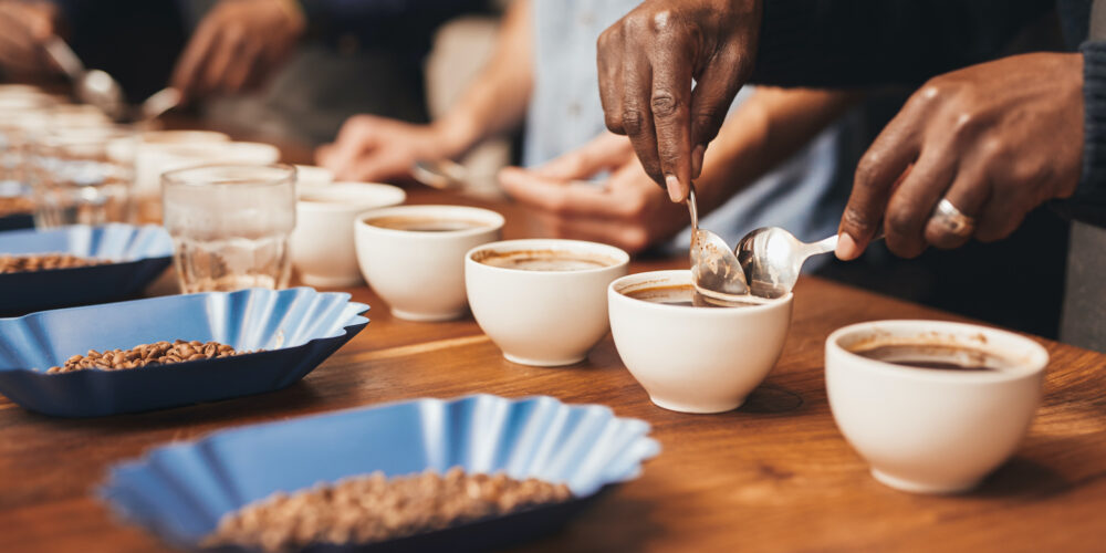 Baristas training to make the perfect cup of coffee